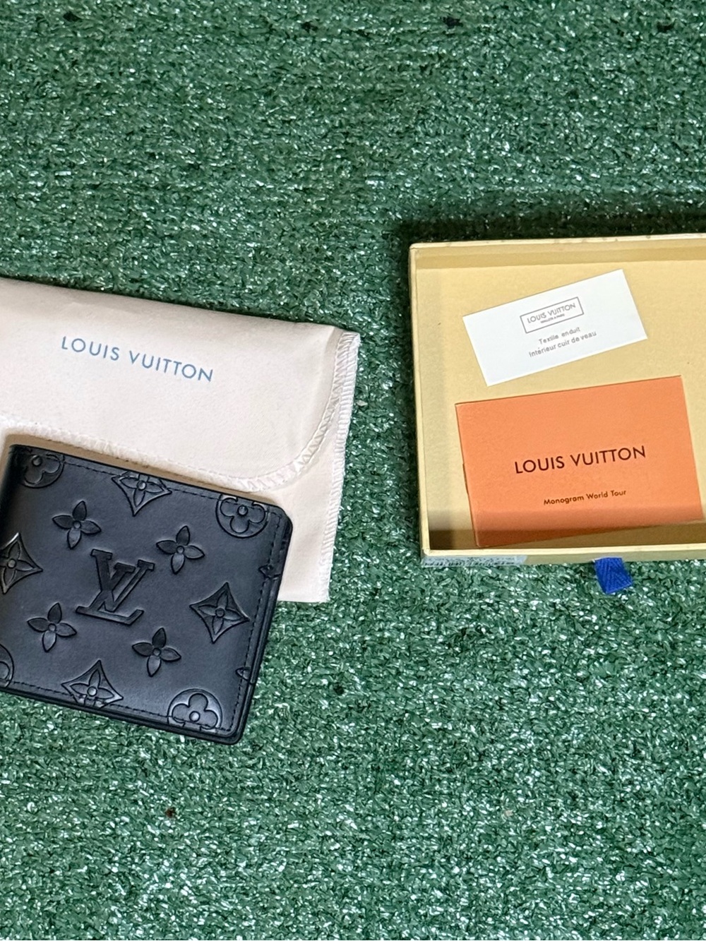 Louis Vuitton Black Embossed Monogram Bi-Fold Wallet